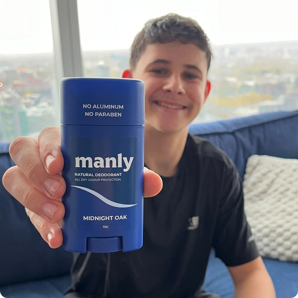 Teen boy with his Midnight Oak boys natural deodorant